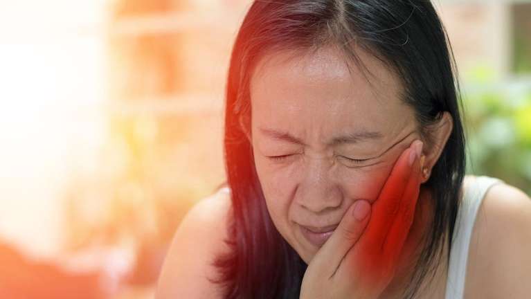 Woman with tooth pain | Sedation Dentist Brisbane